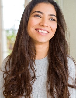 Woman smiling after dentist in Mount Pleasant