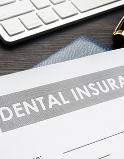 Dental insurance form lying on a table