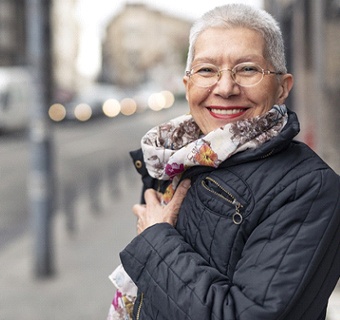 Woman smiling with dental bridge in Mount Pleasant