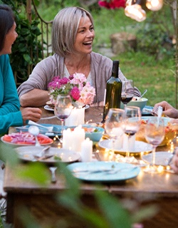 Woman with dental bridge in Mount Pleasant at dinner party