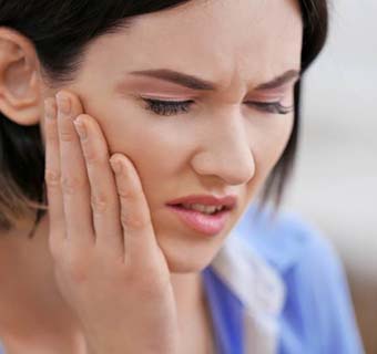 Woman with a toothache in Mount Pleasant