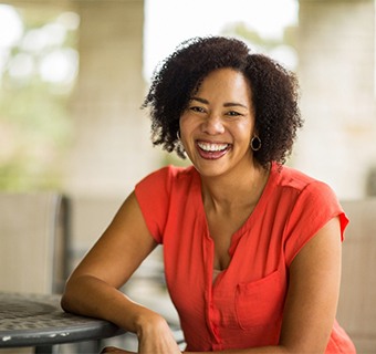 seated woman smiling