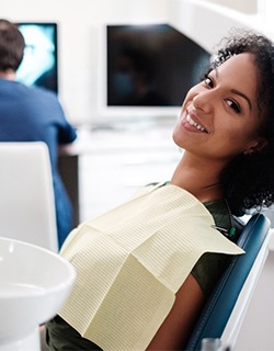 Woman smiling in dental chair