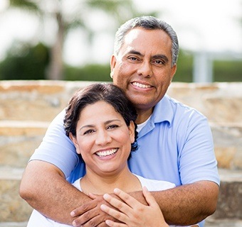 husband hugging wife