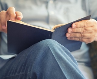 man reading book