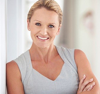 woman smiling in dress