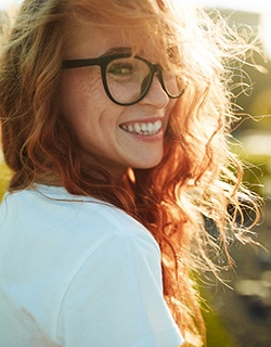 woman smiling and understanding the cost of smile makeovers in Mount Pleasant