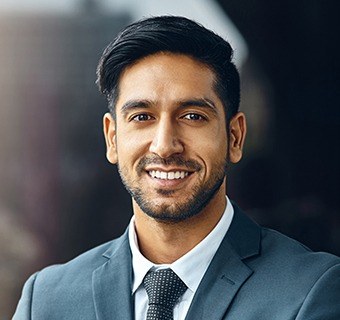 man in suit smiling