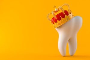 Tooth wearing a crown.